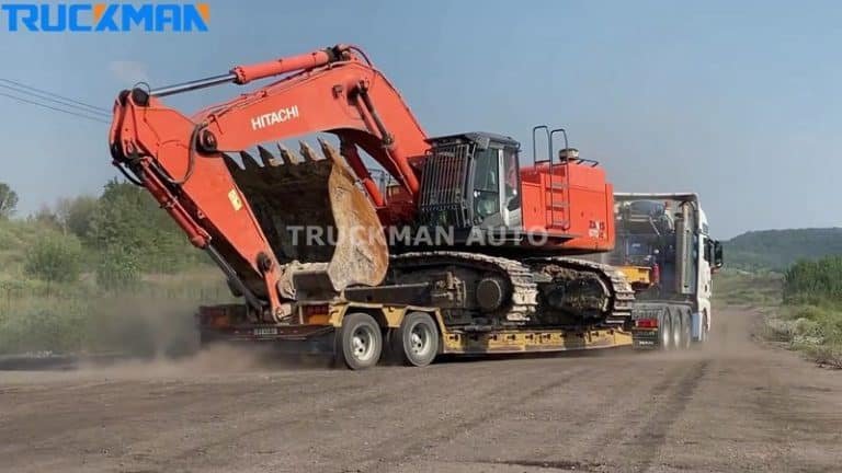 Semi-remorque surbaissée transportant une excavatrice HITACHI avec une capacité de chargement efficace