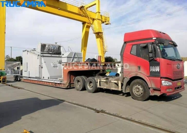 Semi-remorque surbaissée transportant de gros générateurs industriels, utilisation de la remorque dans la logistique des équipements spécialisés.